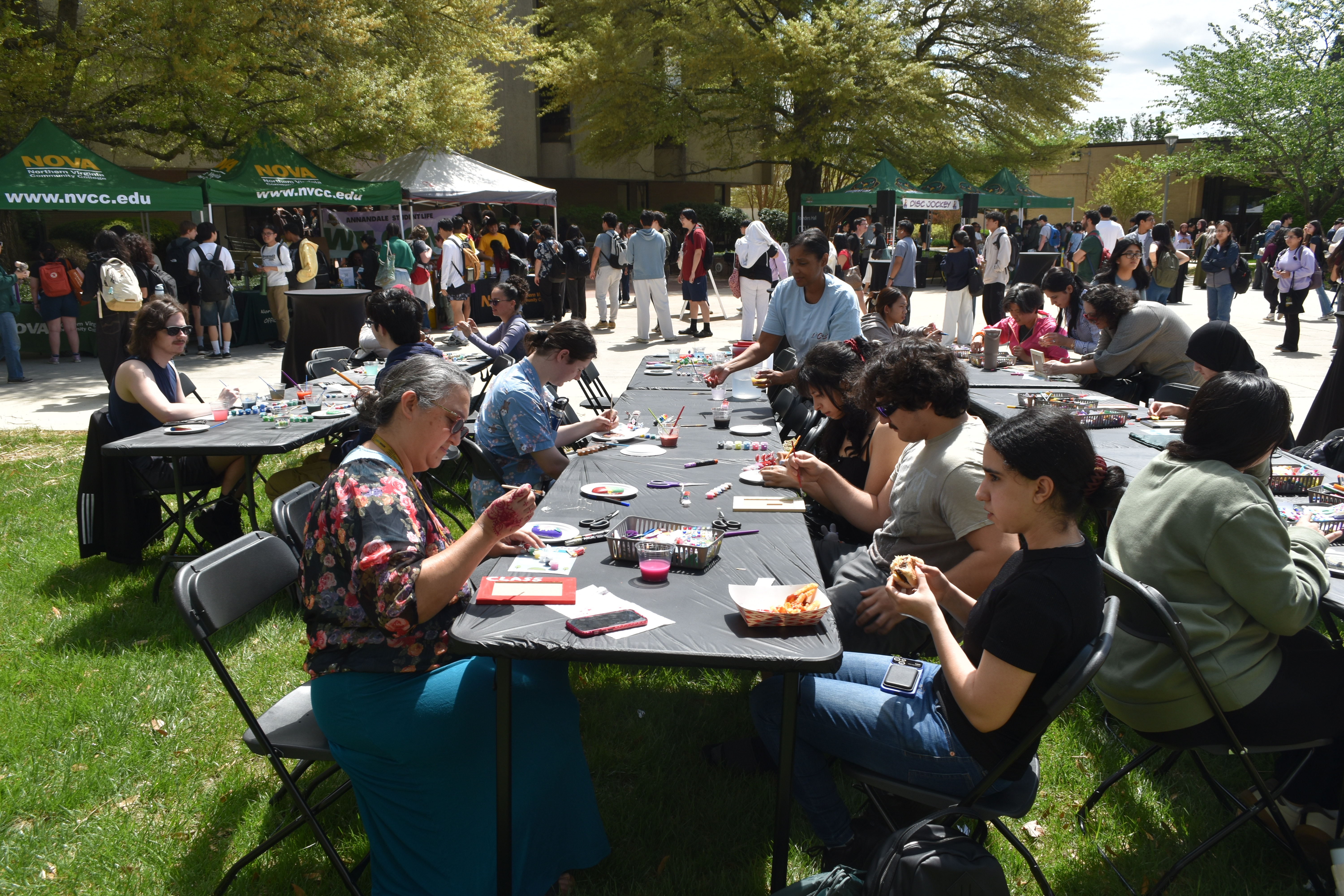 Spring Fling Event people painting crafts
