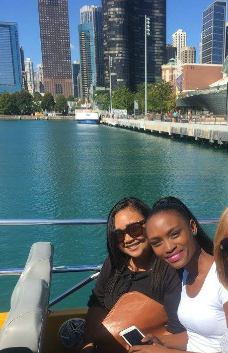 CCI participants at College of DuPage, Erniatun Hartini from Indonesia and Bongiwe Nkomo from South Africa, view the architecture of Chicago from a boat tour