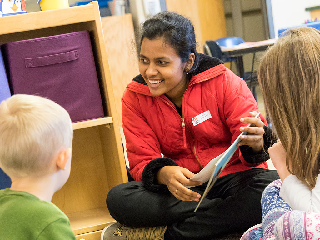 Sandhya reading to children at America Reads.