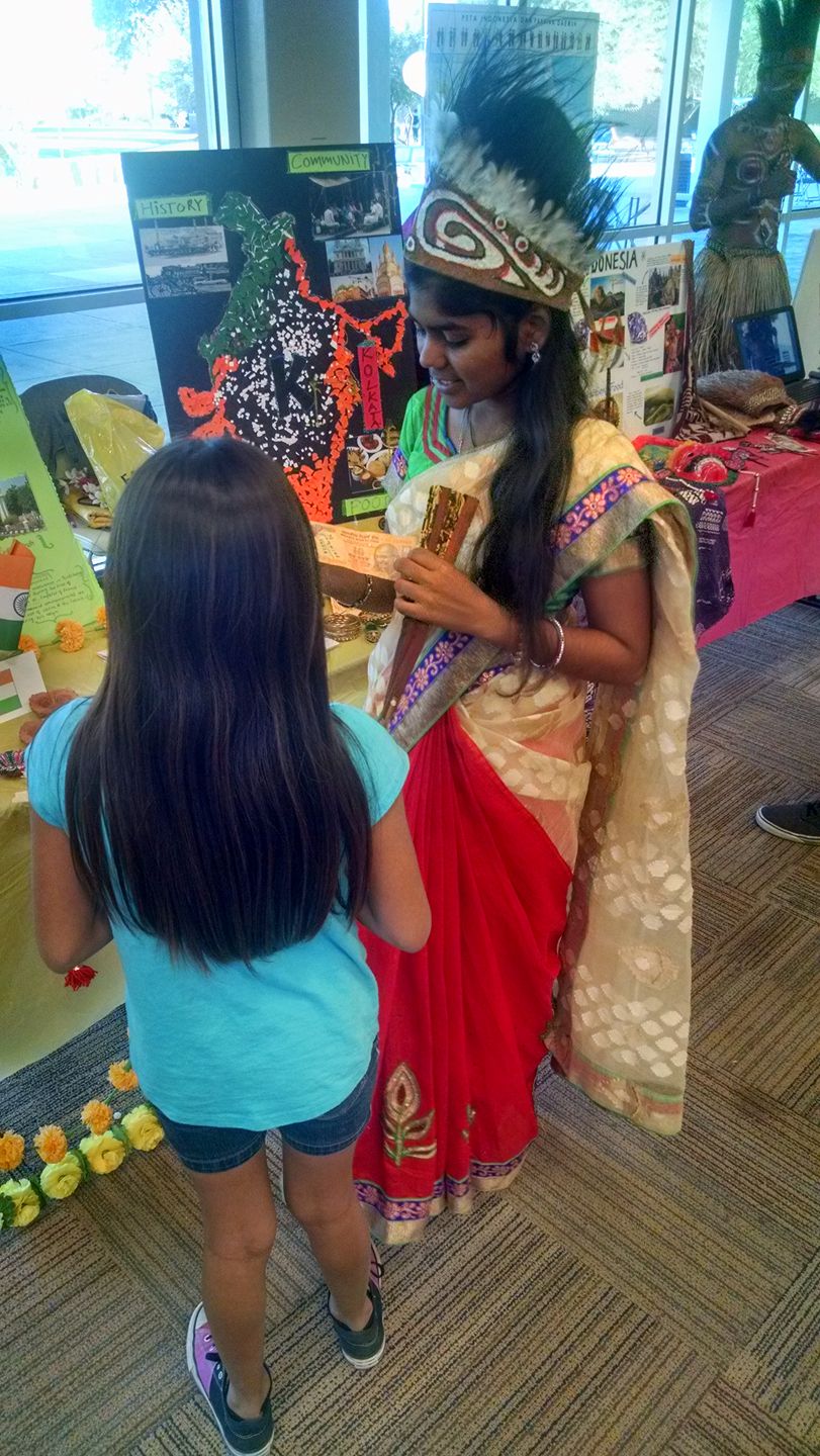 At SCC, Sushma Darshanala explained Indian currency to local elementary school students.
