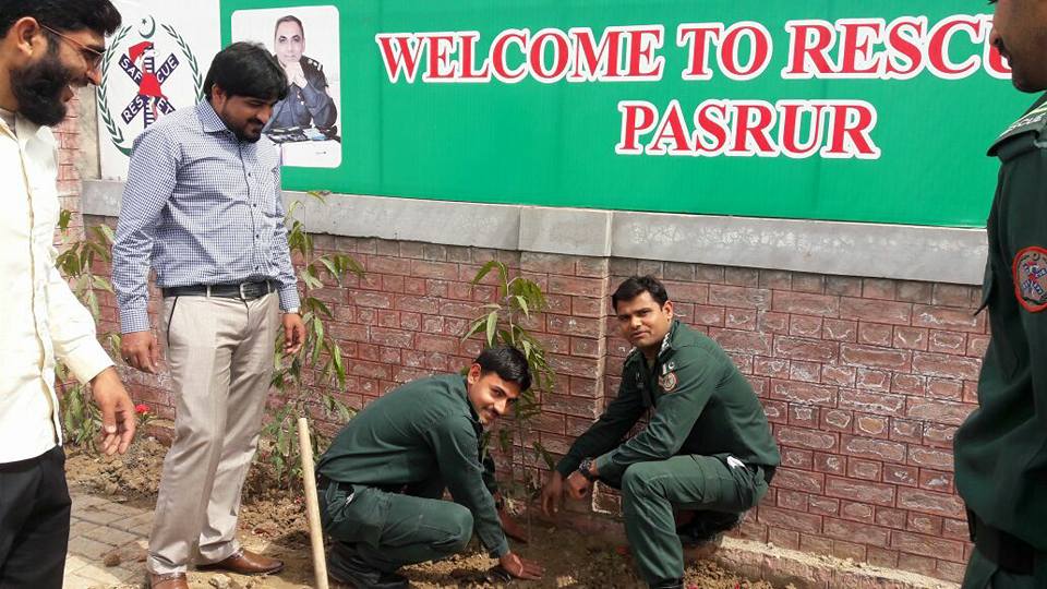 CCI alumnus Muhammad Shahzad Khan (right) plants trees with his fire and rescue squad in Pakistan to welcome spring and celebrate 10 years of the CCI Program.