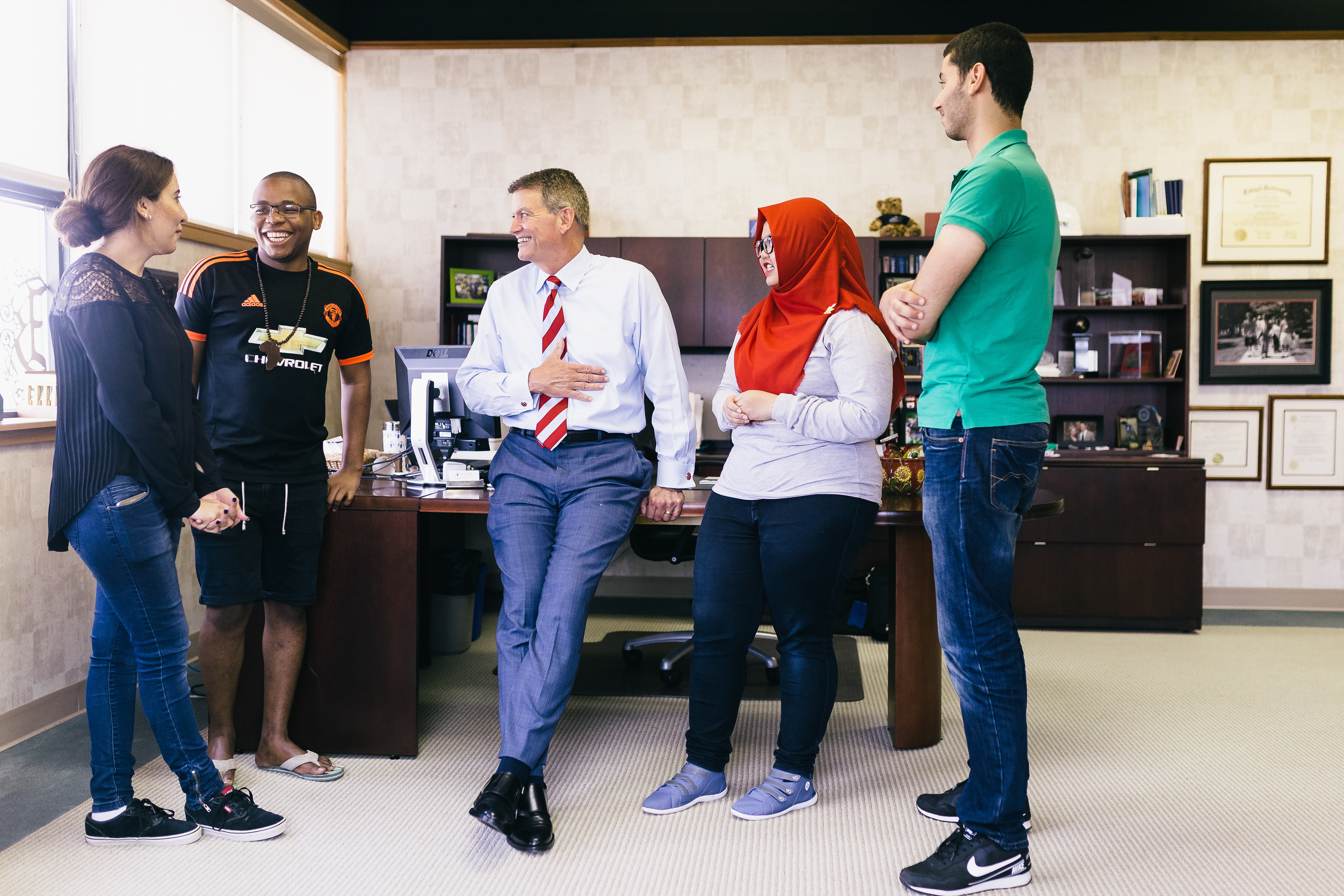 2017-2018 CCI participants Thabiso Tjatjie from South Africa (second from left) and Fadriati Anugrah from Indonesia (second from right) meet Northampton Community College’s President Erickson. Photo from Northampton Community College