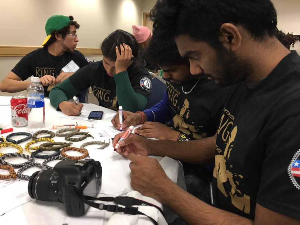 CCI students making bracelets 