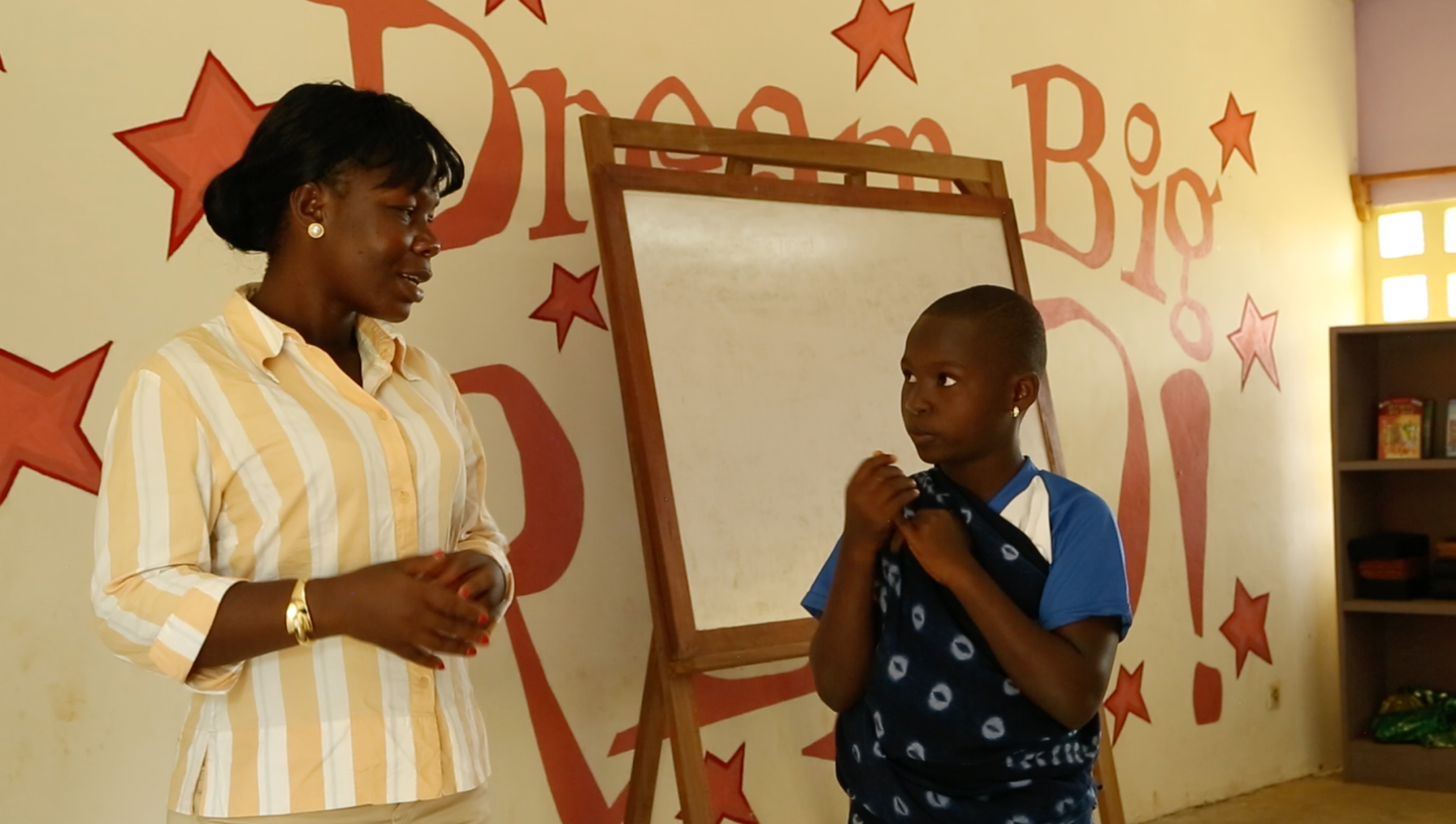 CCI alumna Koffi Philomene Kouakou talks to one of her students in The Children’s House, a children’s community center that she developed in Cote d’Ivoire.