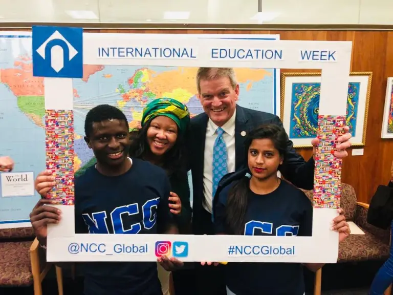 CCI participants at Northampton Community College take a photo frame selfie with Northampton President Dr. Erickson.