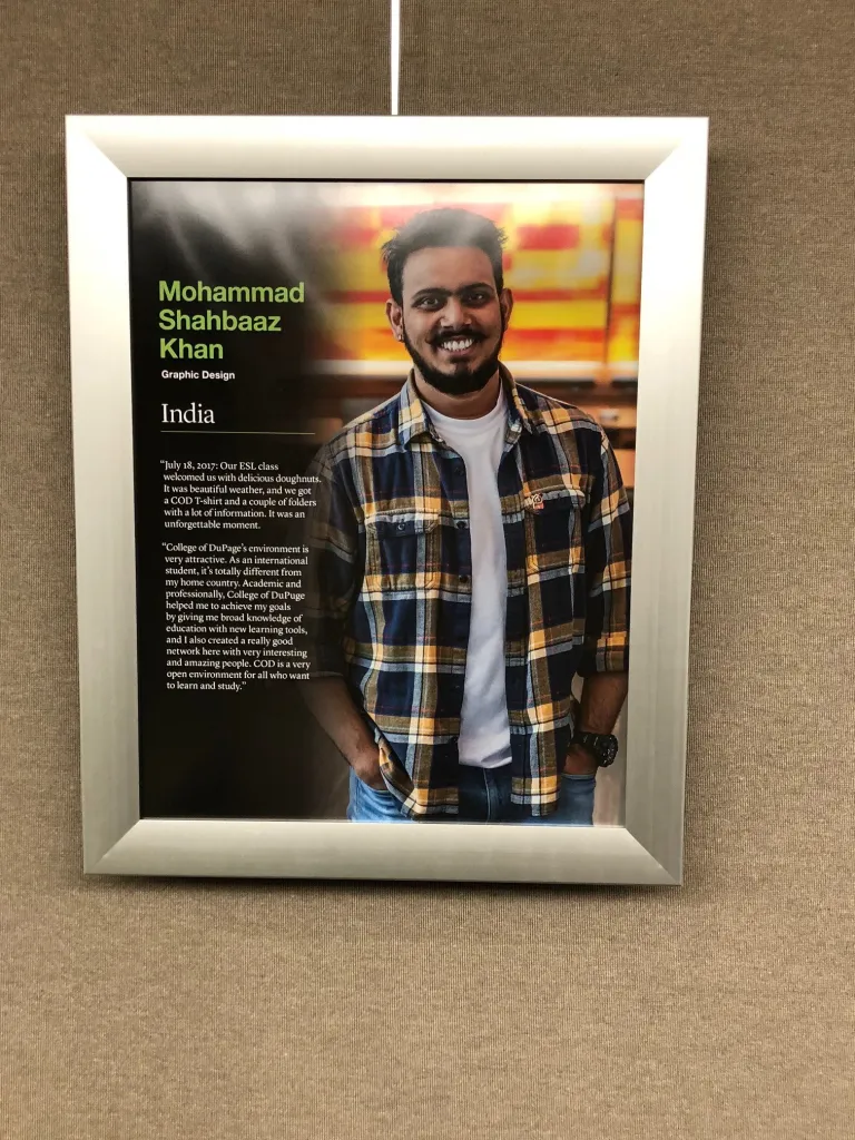 CCI alumnus Mohammad Shahbaaz Khan’s portrait and story in the International Hall at College of DuPage.