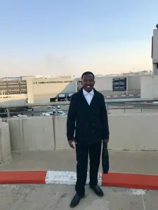 CCI-alumnus-Sibusiso-Chipeta-at-his-new-job-at-City-Lodge-Hotel-in-Johannesburgs-O.R.-Tambo-International-Airport.webp