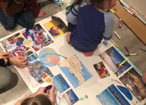 With the help of Eylul, Marlin, and Sarah, the Girl Scouts put together a poster display about the Dominican Republic for World Thinking Day.