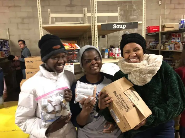 CCI participants from College of DuPage volunteering at the Aurora Interfaith Food Pantry