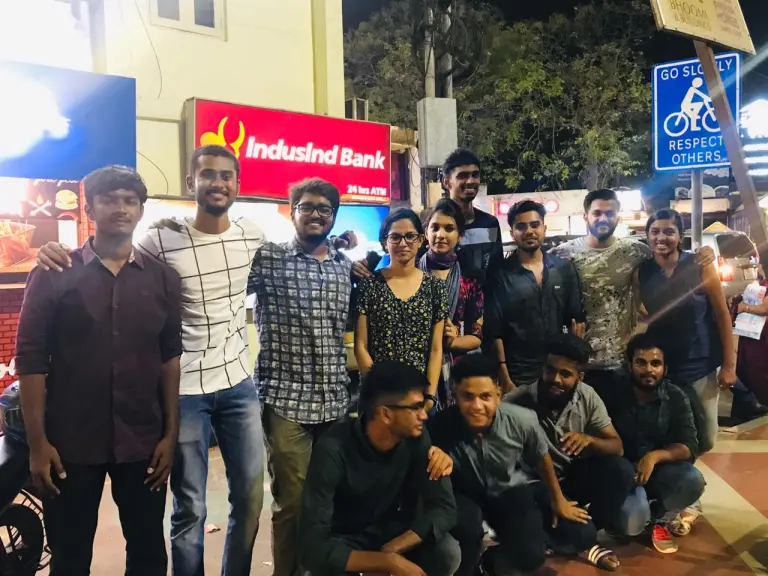 Aswin spends the evening together with his Indian friends before he disembarks for the United States.