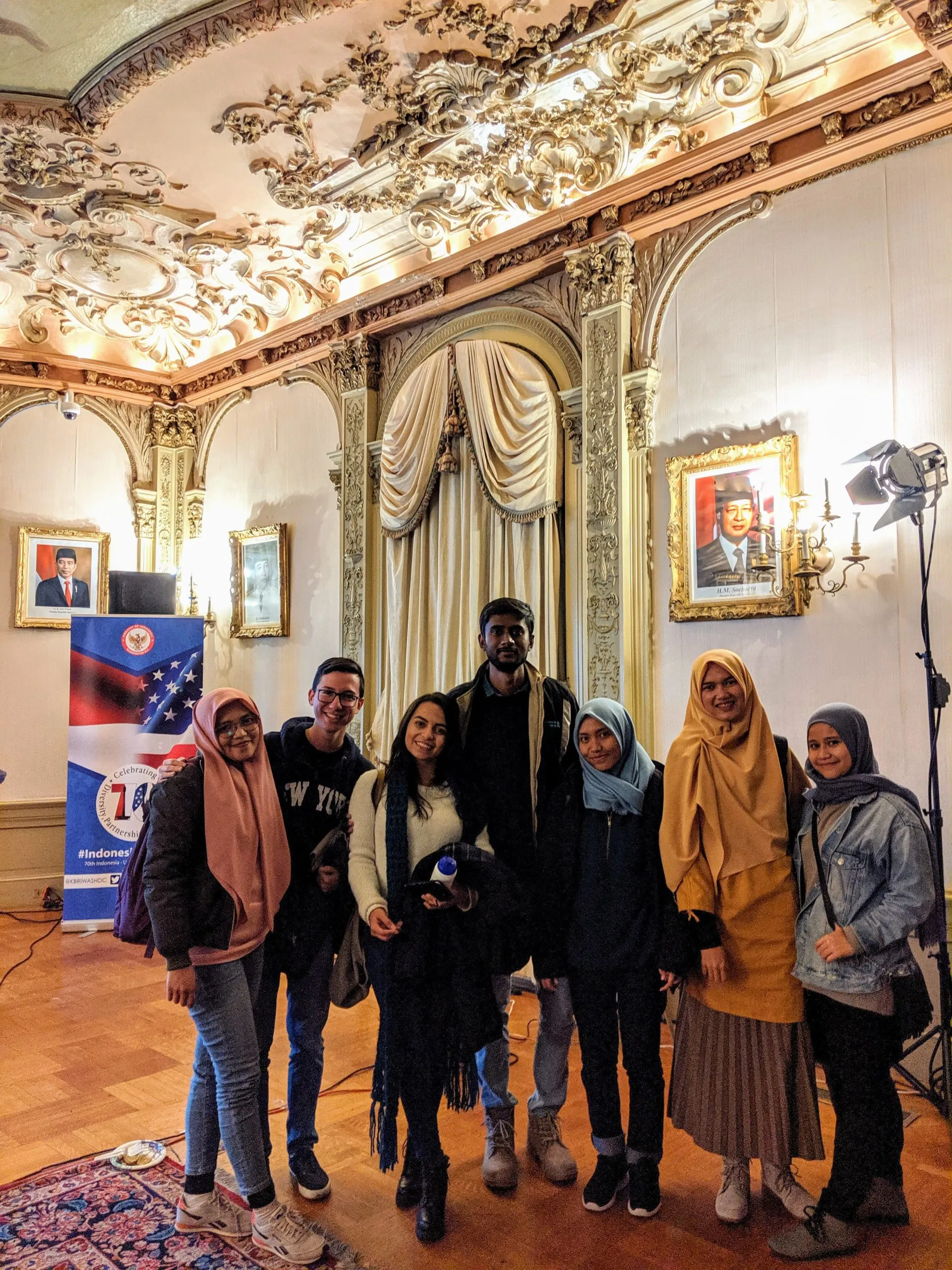Luisa and Aswin pose with their CCI Program friends as they attend a cultural showcase event at the Indonesian Embassy in Washington, D.C.