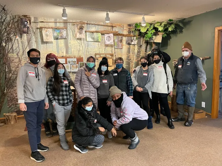 CCI participants at Jamestown Community College pose for a group photo with their nature center guides after a day of volunteerism and sustainability education