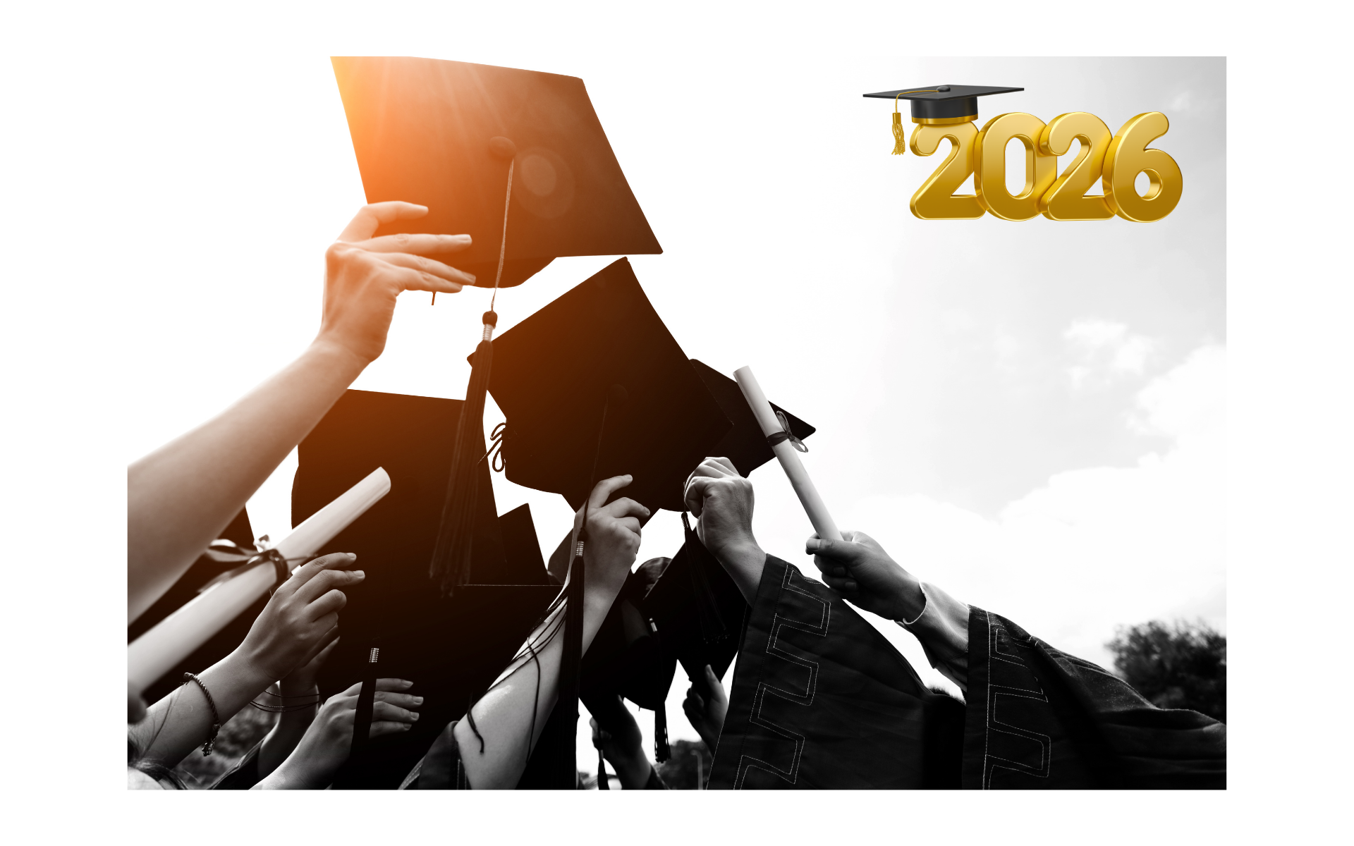 A picture of students graduating holding up their diploma or graduation cap. 