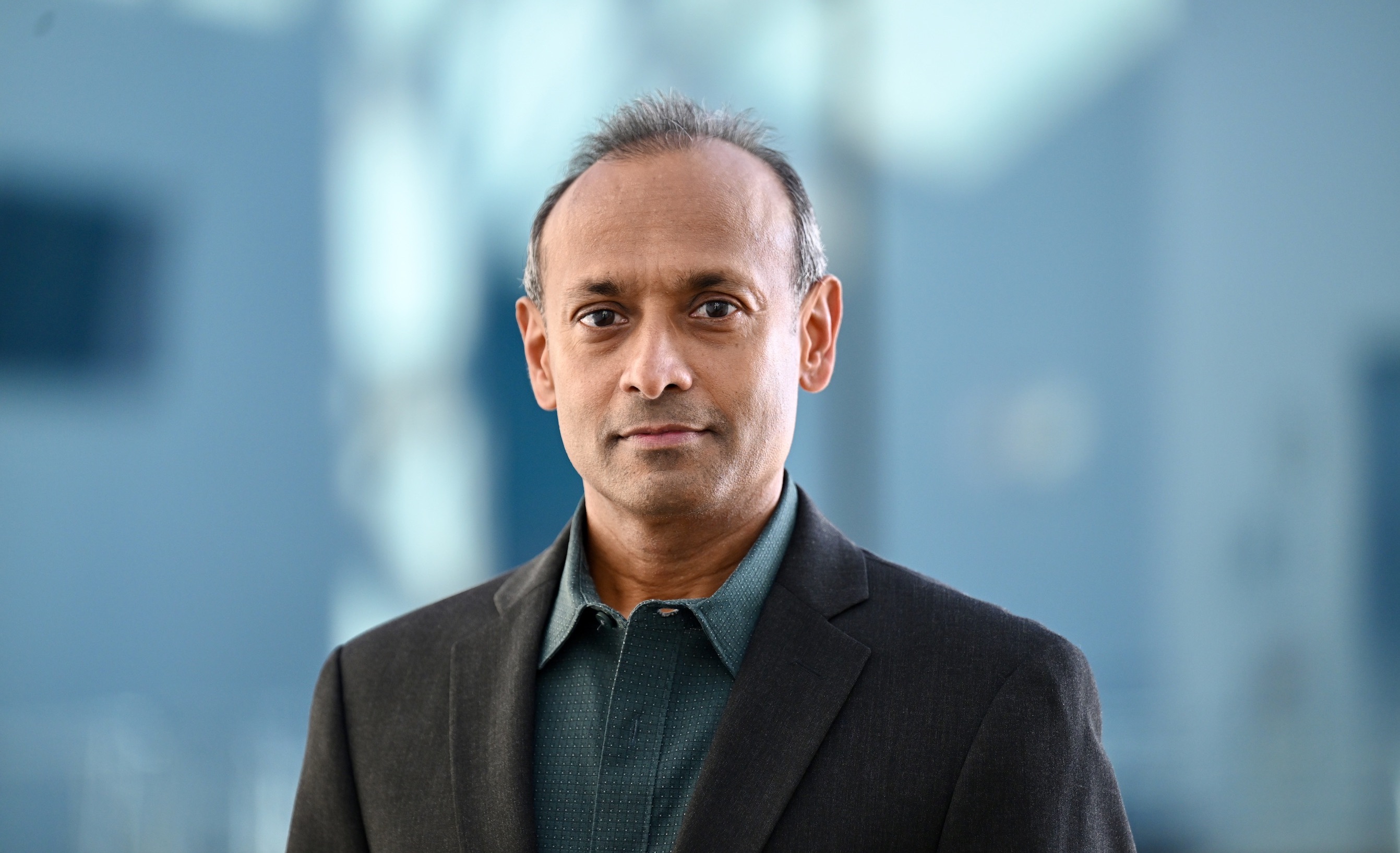 A photo of professor Nasir Ayoub looking at the camera.